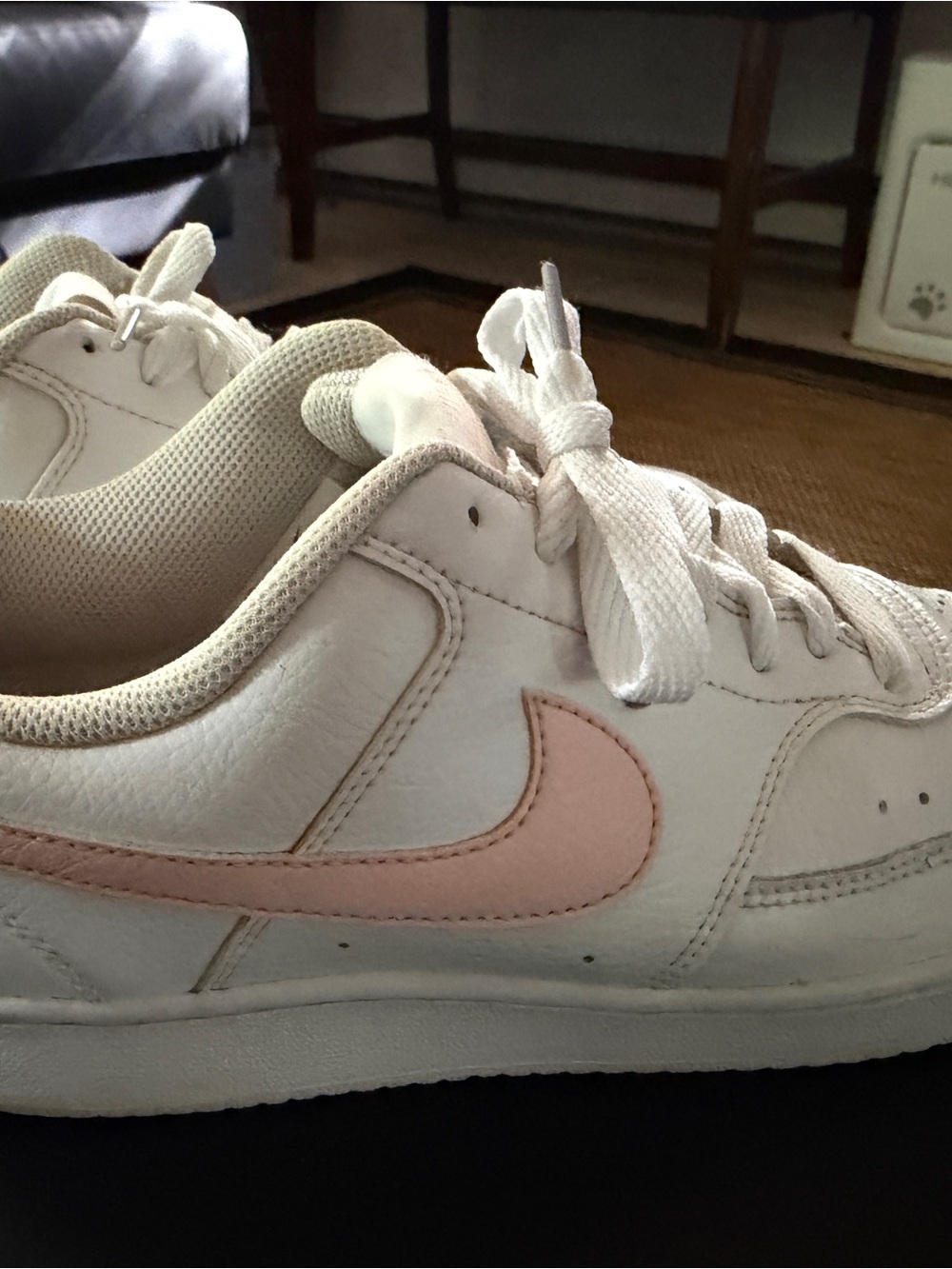 Nike White Low-Top Sneakers with Light Pink Swoosh